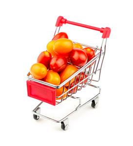 购物车与大规模五彩葡萄西红柿照片